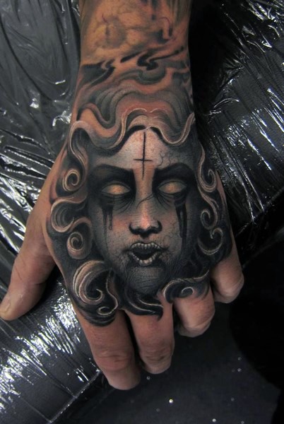 Original designed colored crying mystical woman tattoo on hand