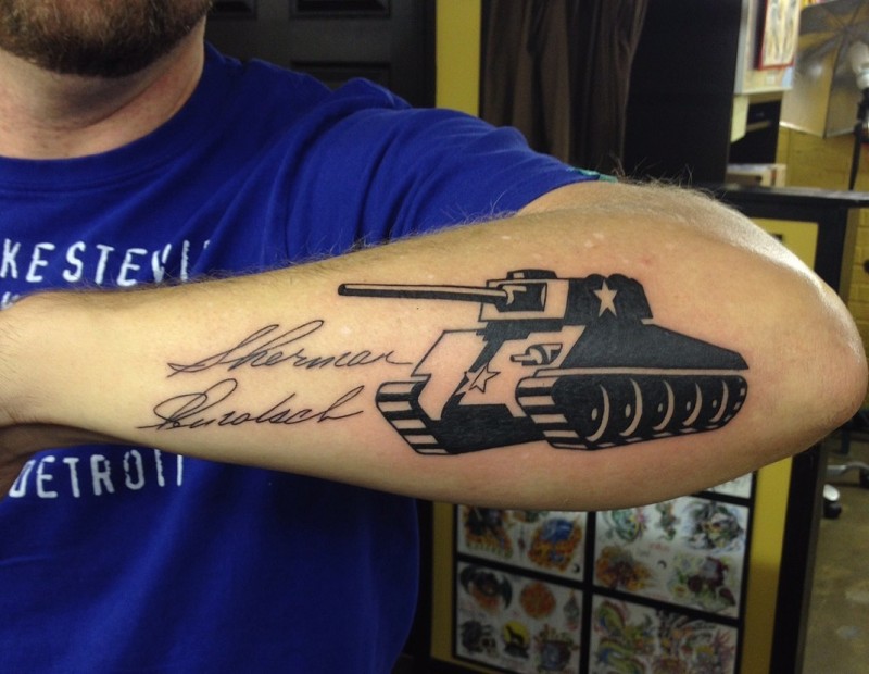 Original looking blackwork style arm tattoo of military tank with lettering