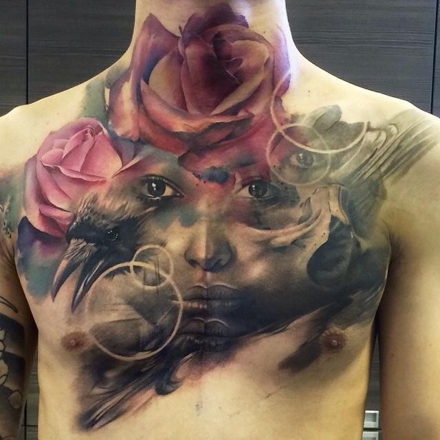 Original mystical designed colorful woman face on chest tattoo combined with crow and flowers