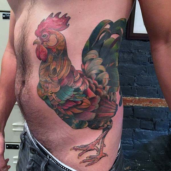 Original painted multicolored detailed cock tattoo on waist