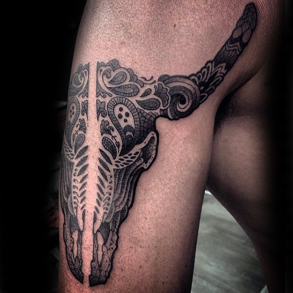 Ornamental style black ink shoulder tattoo of animal skull