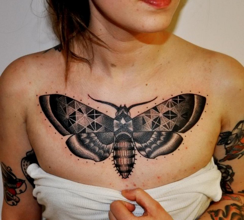 Ornamental style colored chest tattoo of butterfly with ornaments