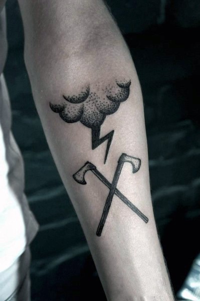 Pair of crossed axes and rainy cloud with flash tattoo on arm