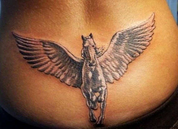 Pegasus tattoo on lower back