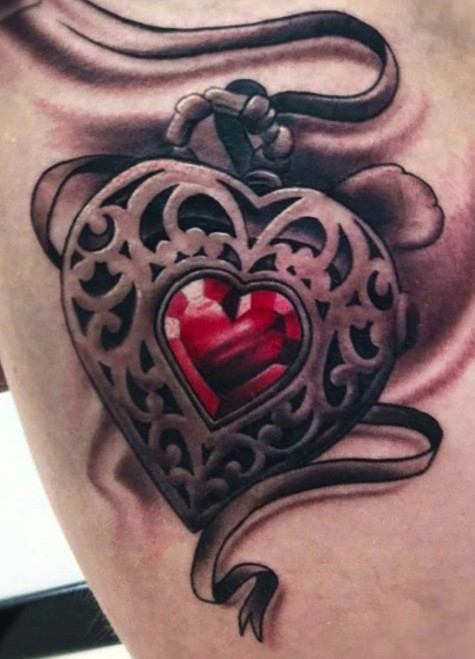Pendant with a red heart tattoo