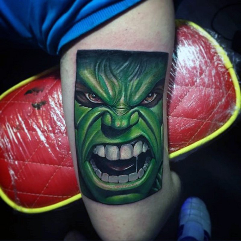 Photo like shaped arm tattoo of Hulk face
