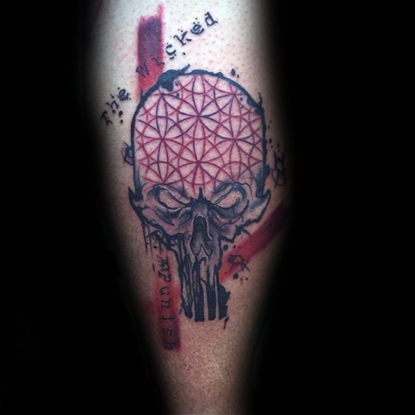 Photoshop style colored leg tattoo of demonic skull and lettering