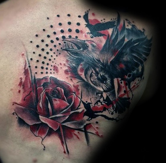Photoshop style colored scapular tattoo of flying crow with rose
