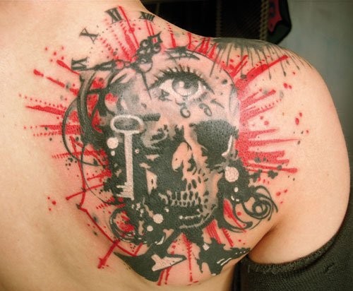 Photoshop style colored shoulder tattoo of human skull with eye and key