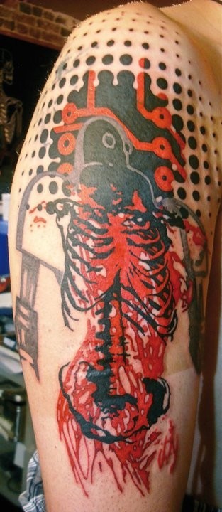 Photoshop style colored shoulder tattoo of bloody human skeleton