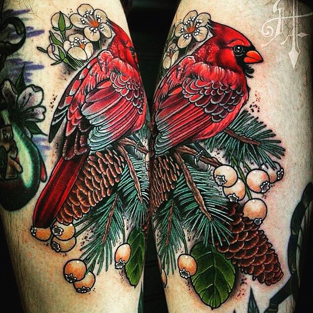 Picture like colored leg tattoo of beautiful bird with berries