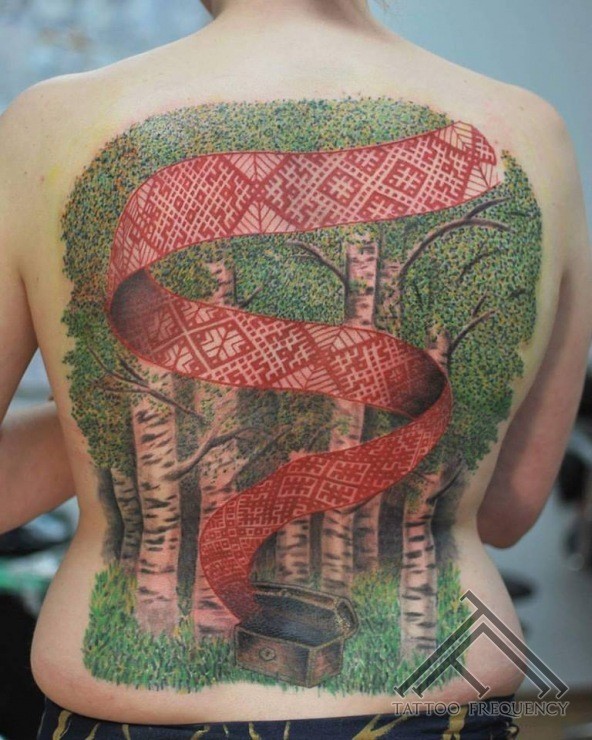 Picture style colored whole back tattoo if deep forest with red ribbon