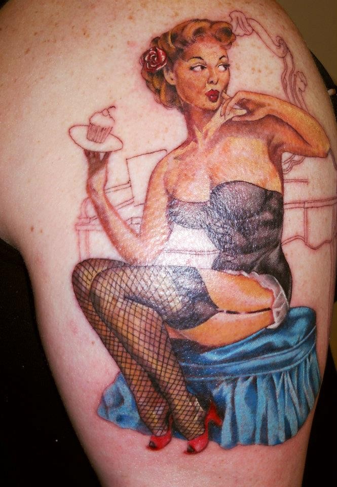 Pin up girl with cupcake tattoo by Ian Loughlin