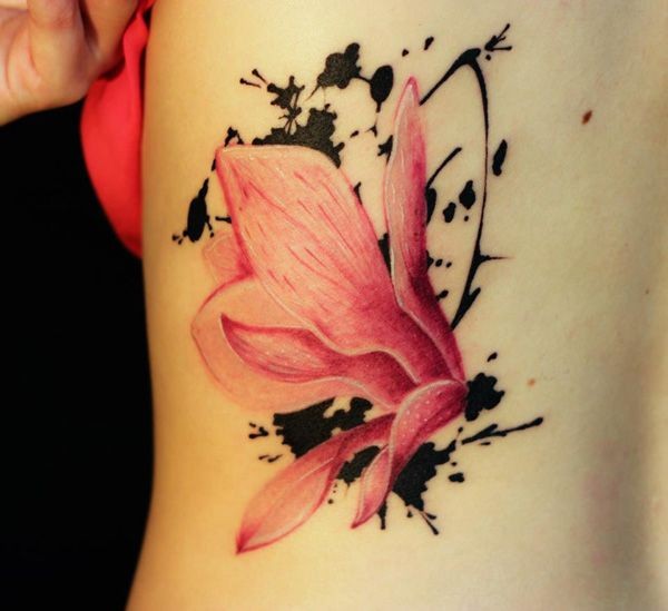 Pink colored back tattoo of sweet flower