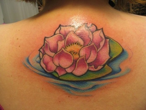 Pink lotus on water tattoo