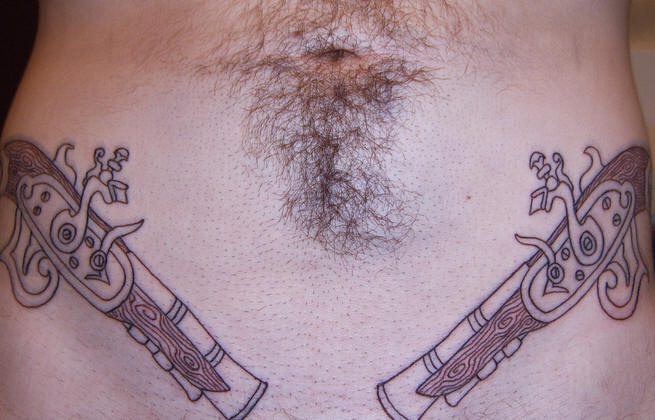 Pirate muskets lower belly tattoo