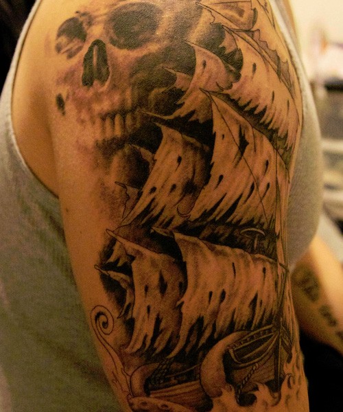 Pirate ghost ship and skull tattoo