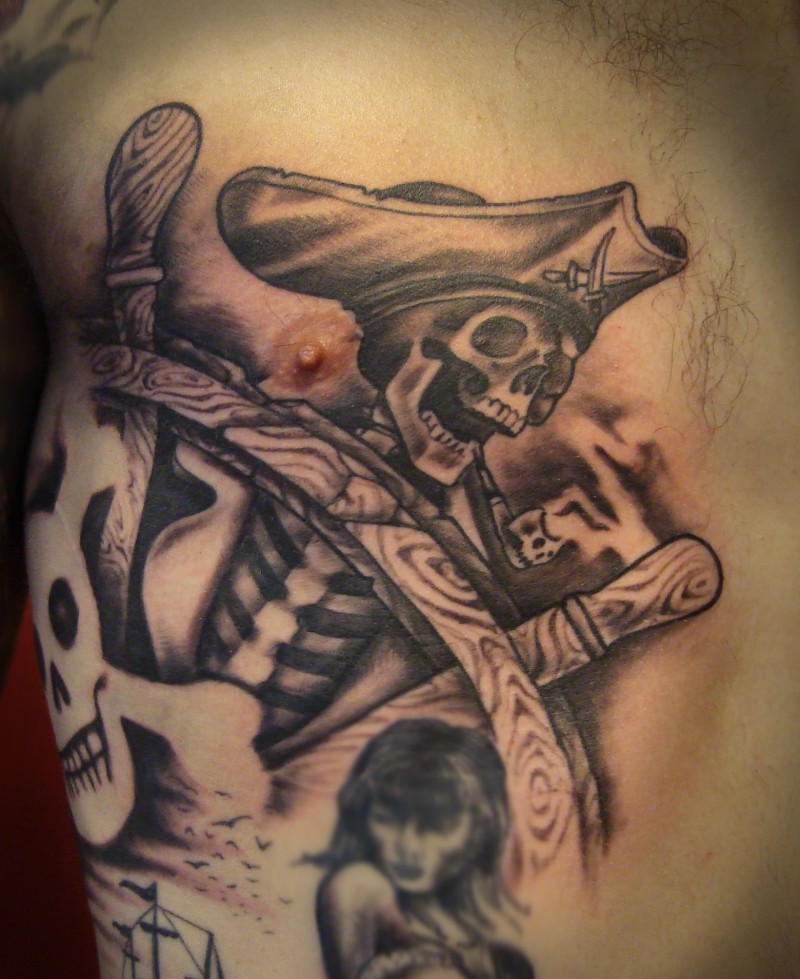 Pirate skeleton at captain wheel tattoo