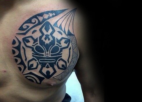 Polynesian style colored chest tattoo of little mask