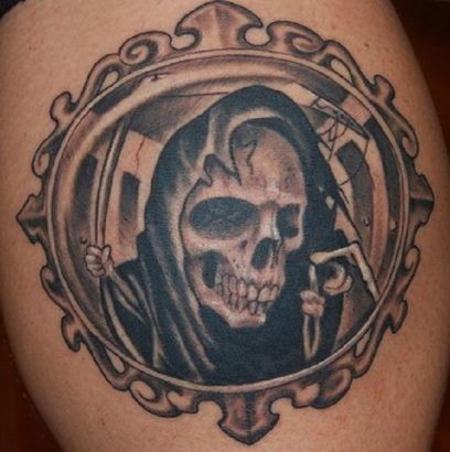 Portrait of death in frame tattoo