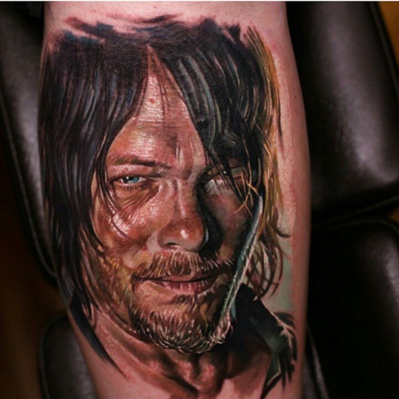Portrait style colored arm tattoo of famous actor face