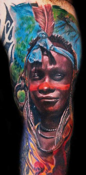 Portrait style colored arm tattoo of tribal human