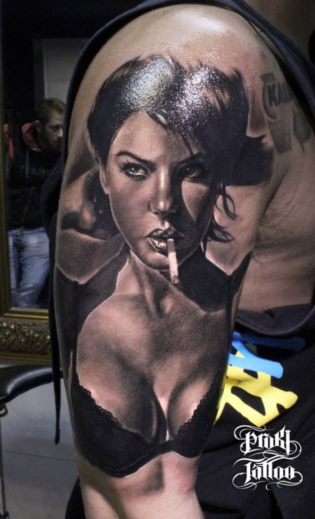Portrait style very detailed shoulder tattoo of seductive smoking woman