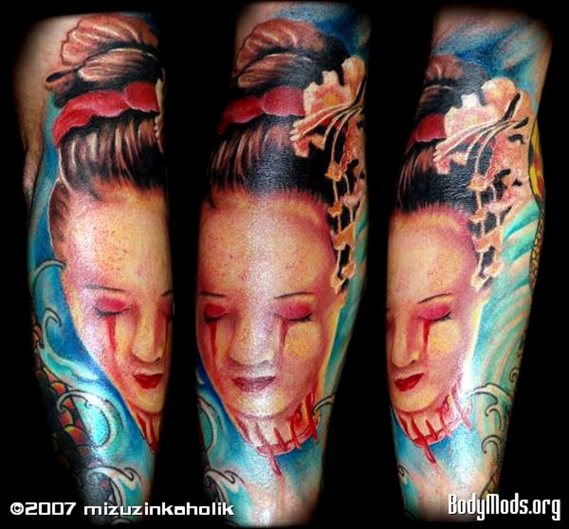 Pretty Asian Geisha severed head with bloody tears colored sleeve tattoo