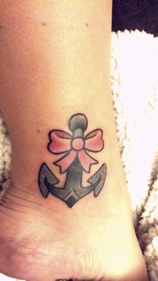 Pretty traditional tattoo with anchor on foot