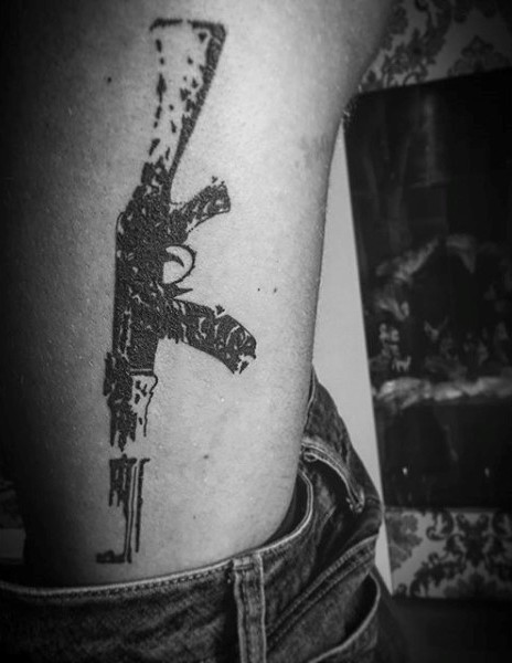 Print like black ink side tattoo of AK rifle