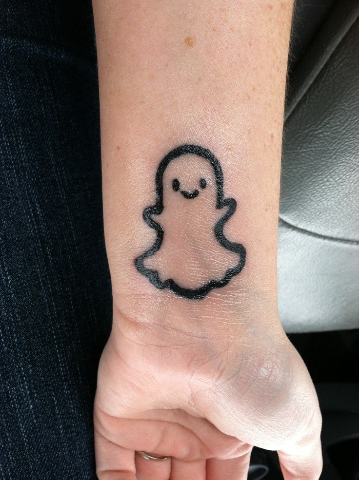 Prtetty ghost tattoo on wrist design