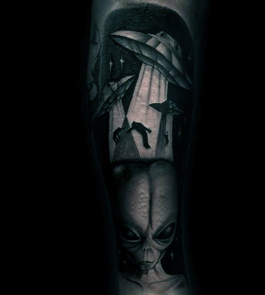 Real photo like amazing painted black and white alien with ships and human tattoo on arm