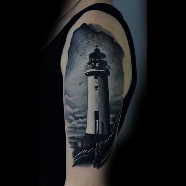 Real photo like black and white lighthouse tattoo on shoulder length