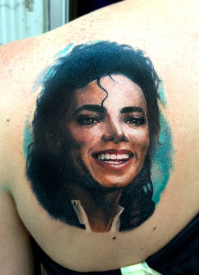 Real photo like colored memorial Michael Jackson portrait tattoo on shoulder