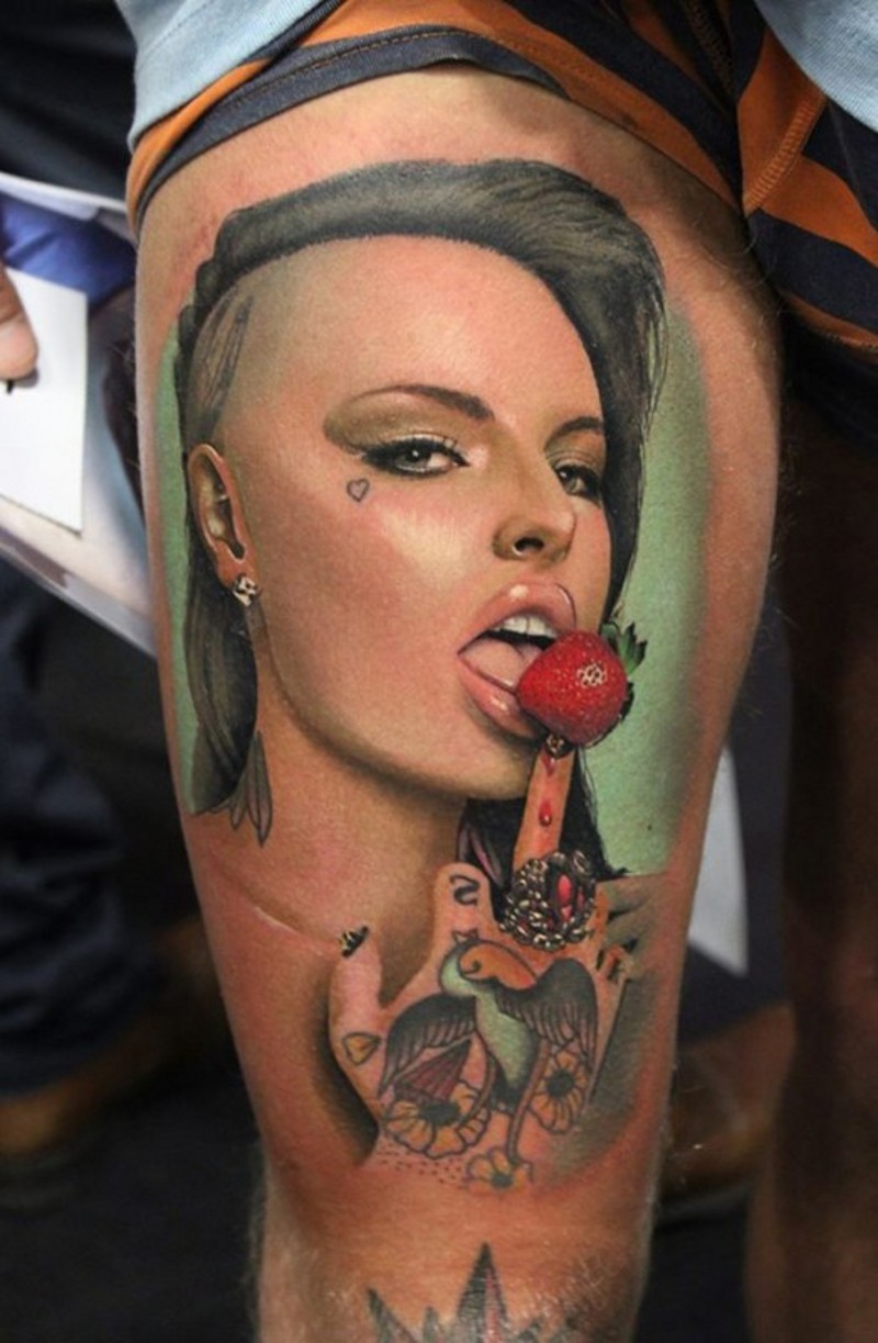 Real photo like colored thigh tattoo of seductive woman licking strawberry portrait