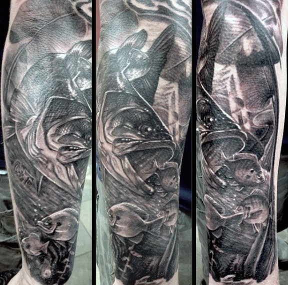Real photo like detailed black and white various fishes tattoo on sleeve