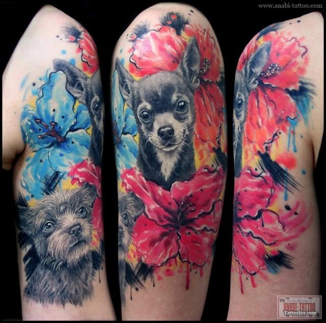 Real photo like very detailed colored cute dogs portraits tattoo on shoulder stylized with abstract flovers