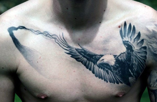 Realism style black and white chest tattoo of very detailed crow