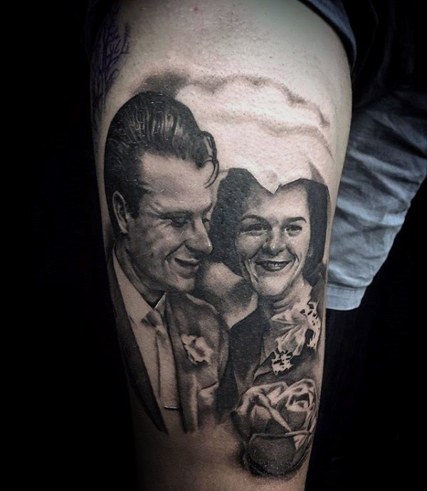 Realism style black and white happy couple tattoo