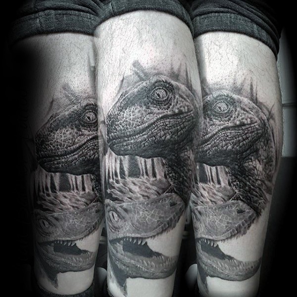 Realism style black and white leg tattoo of various dinosaurs