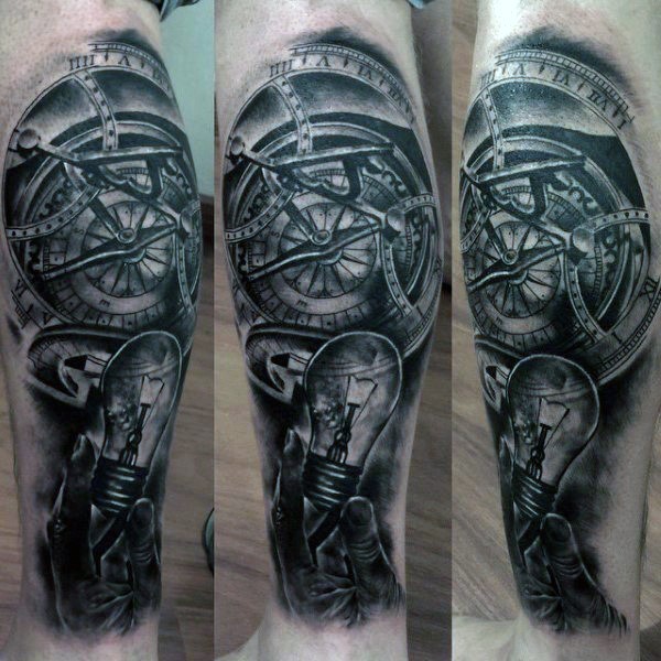 Realism style black and white leg tattoo of mechanic compass and bulb