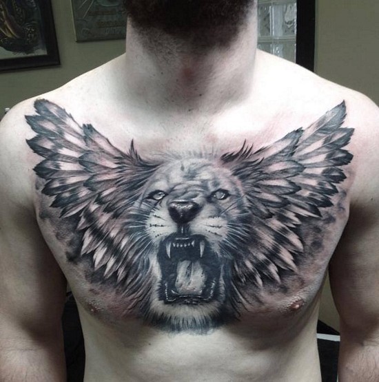 Realism style black ink chest tattoo of lion face and wings