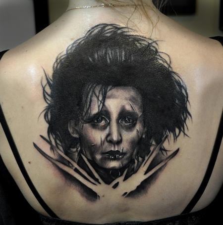 Realism style black ink Edward scissors-hands portrait tattoo on back