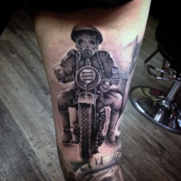Realism style black ink man in gas mask riding bicycle tattoo on thigh
