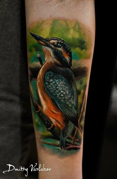 Realism style colored arm tattoo of beautiful bird