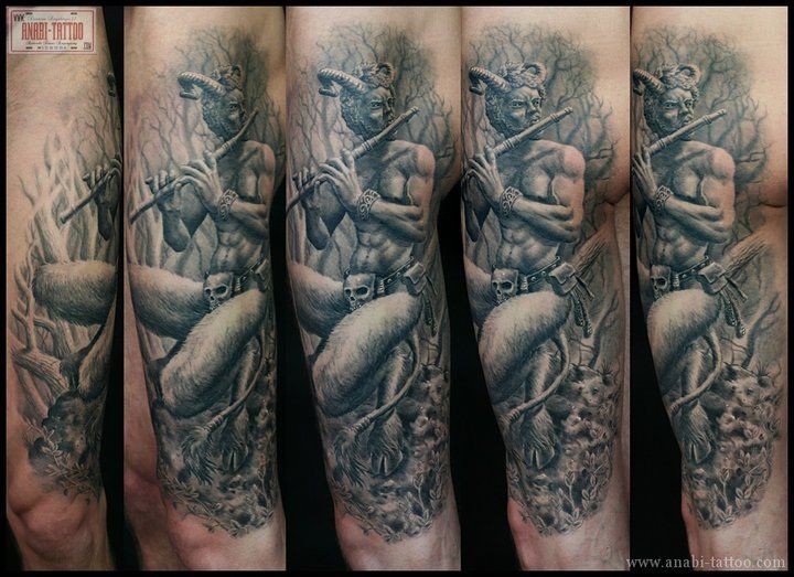 Realism style colored arm tattoo of devils stone statue