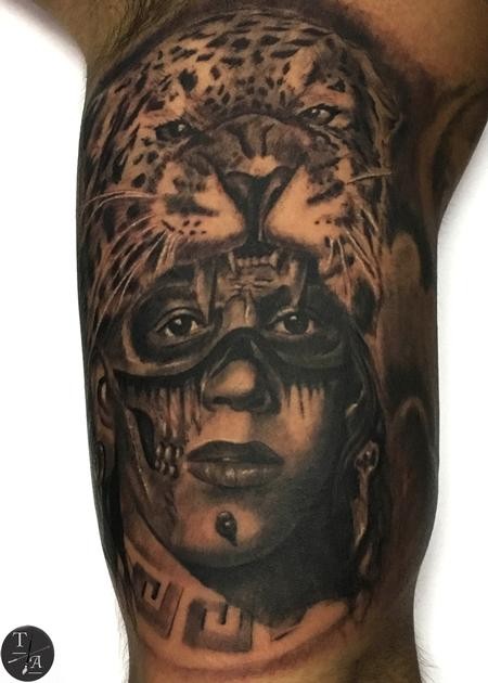 Realism style colored arm tattoo of tribal man with leopard skin