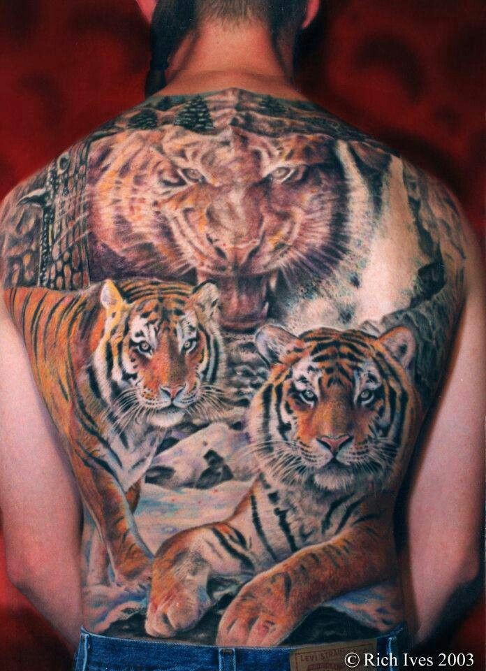 Realism style colored back tattoo of big tiger family