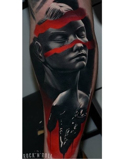 Realism style colored biceps tattoo of cool looking human statue