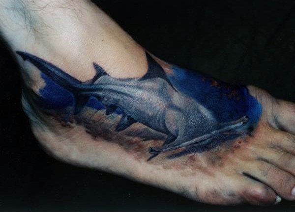Realism style colored foot tattoo of shark